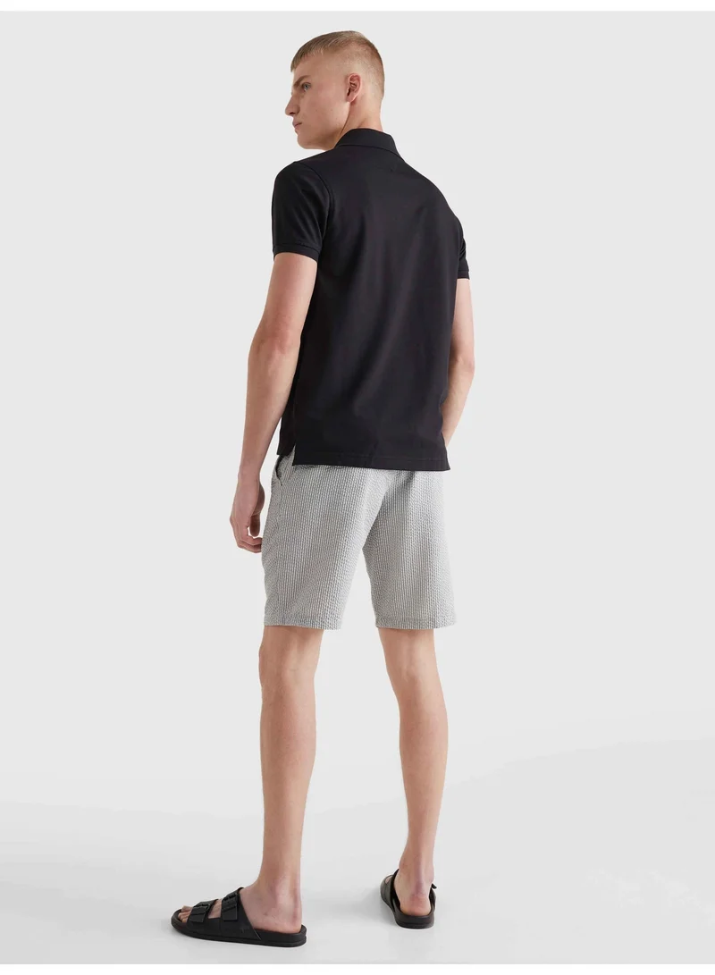 Tommy Hilfiger Black 1985 Slim Fit Pique Polo Shirt for Men | Best Price UAE