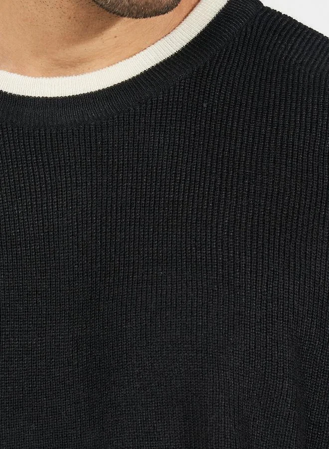 ستايلي سويتر محبوك بقصة مريحة وتفاصيل مُتباينة