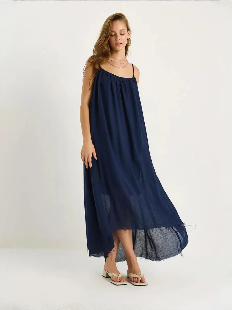 بيانكو لوتشي فستان ميدي مخطط من لوكسي بياقة دائرية