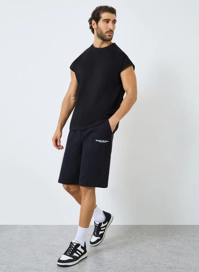 Styli Active Minimal Print Oversized Terry Shorts
