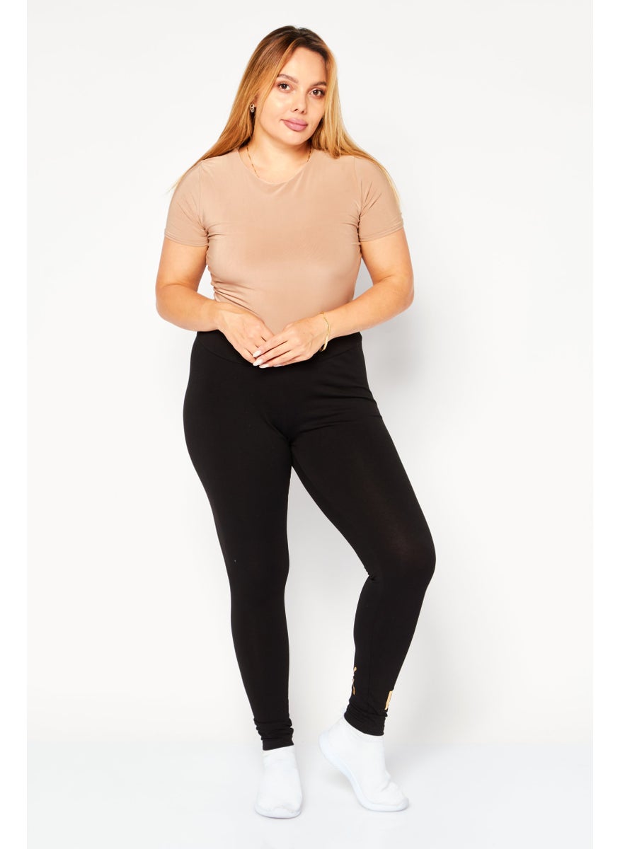 PUMA Women Sportswear Fit Training Tights, Black/Gold  - Image 4