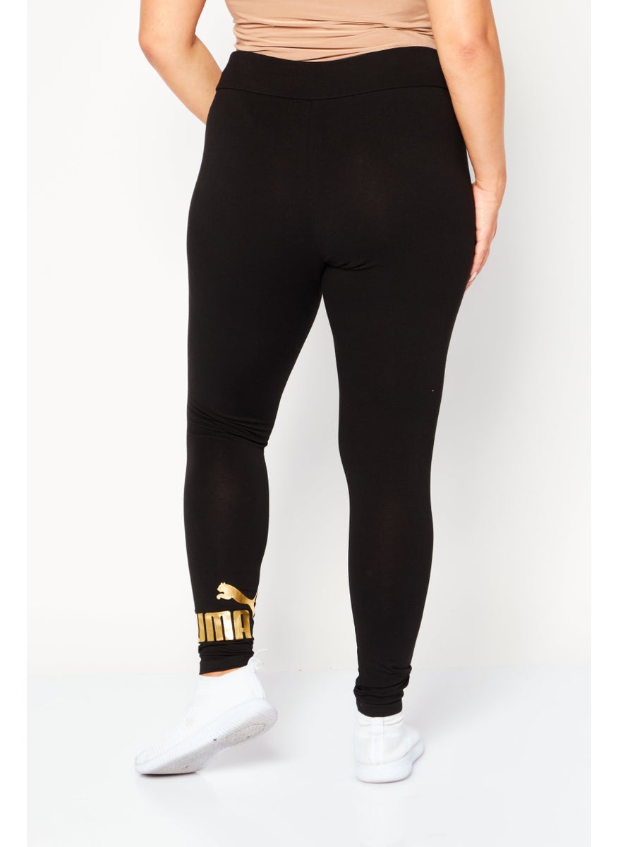 PUMA Women Sportswear Fit Training Tights, Black/Gold  - Image 3