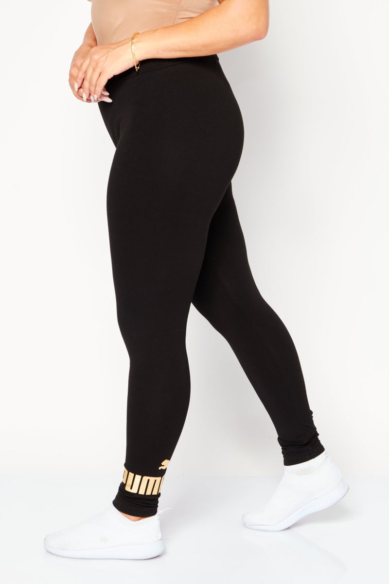 PUMA Women Sportswear Fit Training Tights, Black/Gold - Image 2