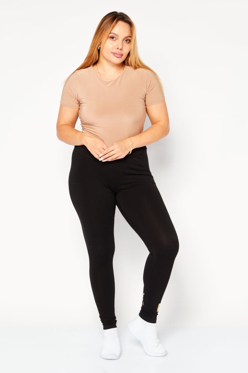 PUMA Women Sportswear Fit Training Tights, Black/Gold - Image 4