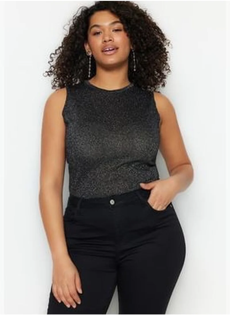 trendyol Black Wrap-around Fine Tricot Blouse with a Shine TBBSS23AF00019