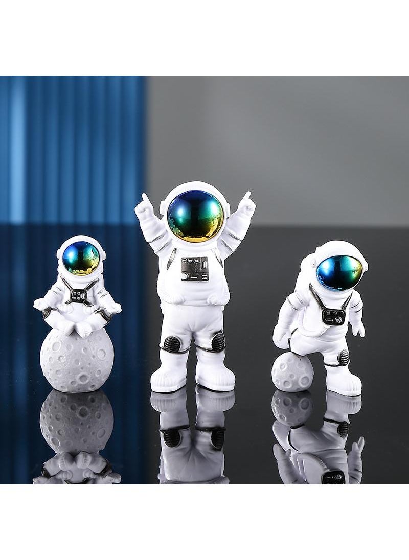 Bluejw 4-Piece Astronaut Figurine Statue Set Astronaut Figure Sculpture For Desktop And Tabletop Decor Resin Spaceman Planet Desk Ornament For Outer Space Themed Bedroom Decor Cake Toppers Decoration Model Set  - Image 5