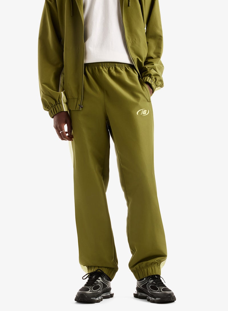 New Balance Trackside Woven Sweatpants - Image 1