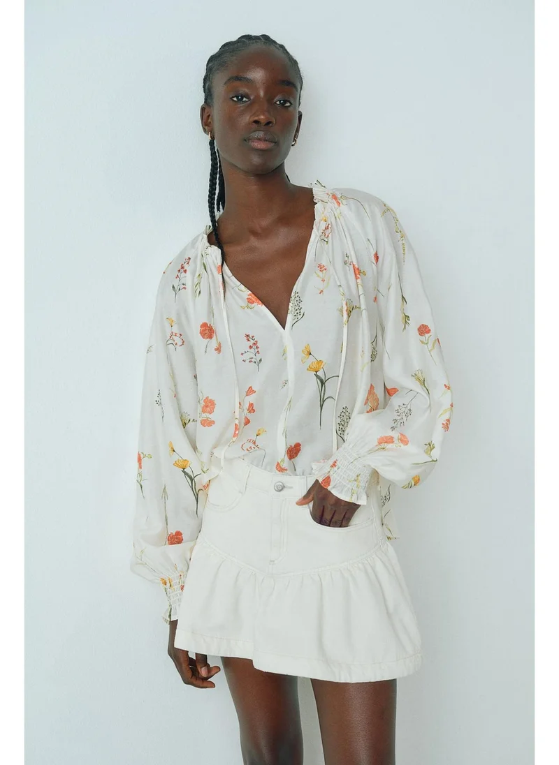 H&M Oversized tie-neck blouse