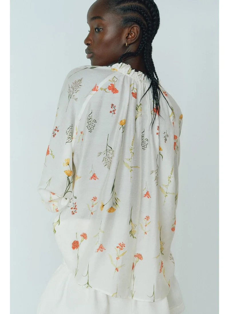 H&M Oversized tie-neck blouse