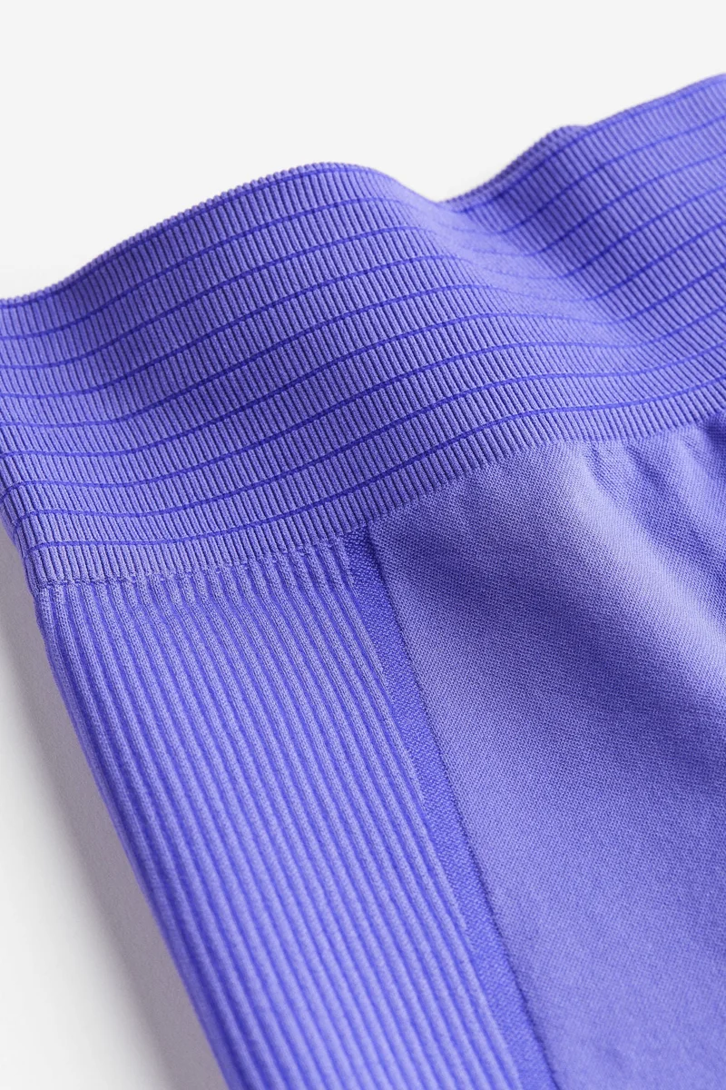 اتش اند ام كولون رياضي بلا درزات لتشكيل الجسم من نسيج دراي موف