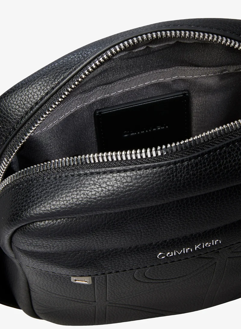 Calvin Klein  Embossed Emblem Logo Reporter Bag for Men | Best Price UAE