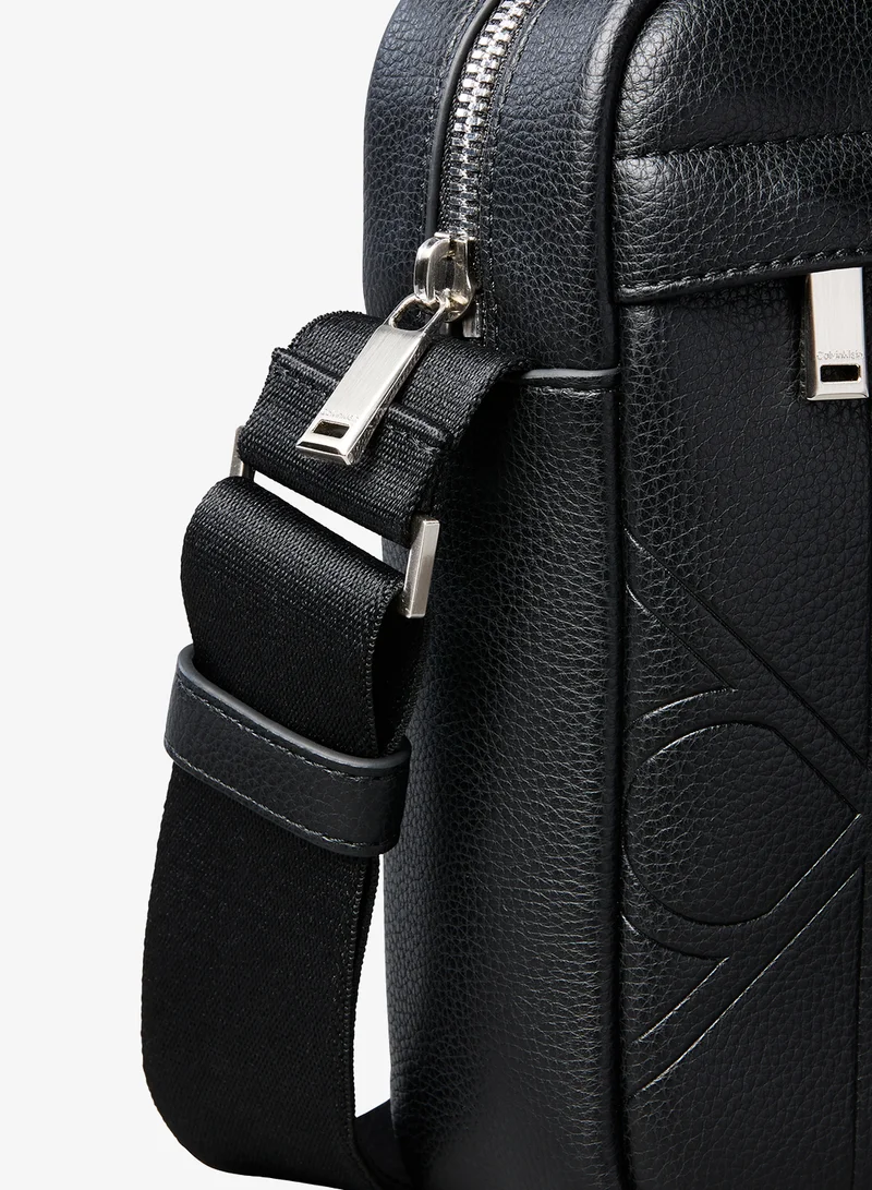 Calvin Klein  Embossed Emblem Logo Reporter Bag for Men | Best Price UAE