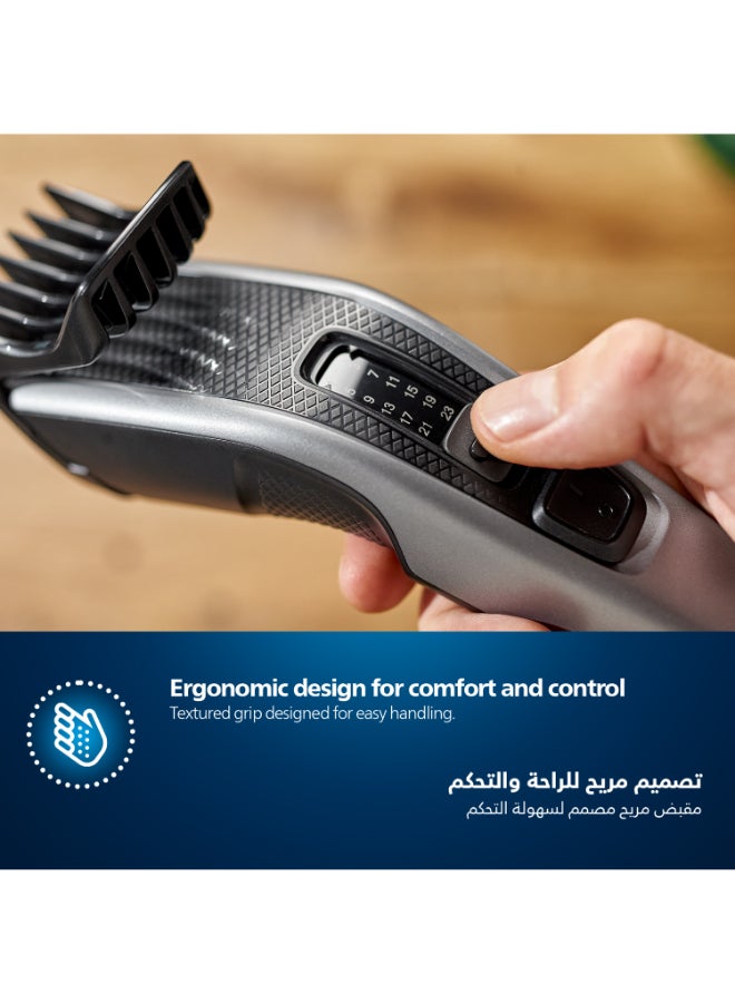 ماكينة قص الشعر HC3525/13 من Philips | قص شعر سهل ومتساوٍ | شفرات ذاتية الشحذ، 13 إعداد للطول | 45 دقيقة من الاستخدام اللاسلكي، تقنية DuraPower، شفرات قابلة للغسل أسود/ رمادي