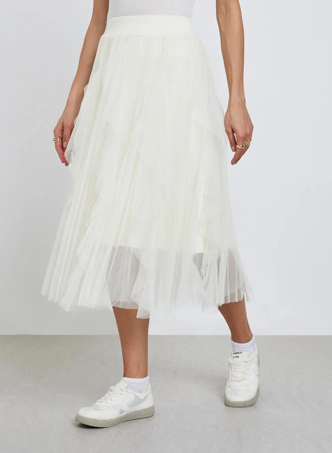 تايك تو تنورة ميدي من التول الشبكي