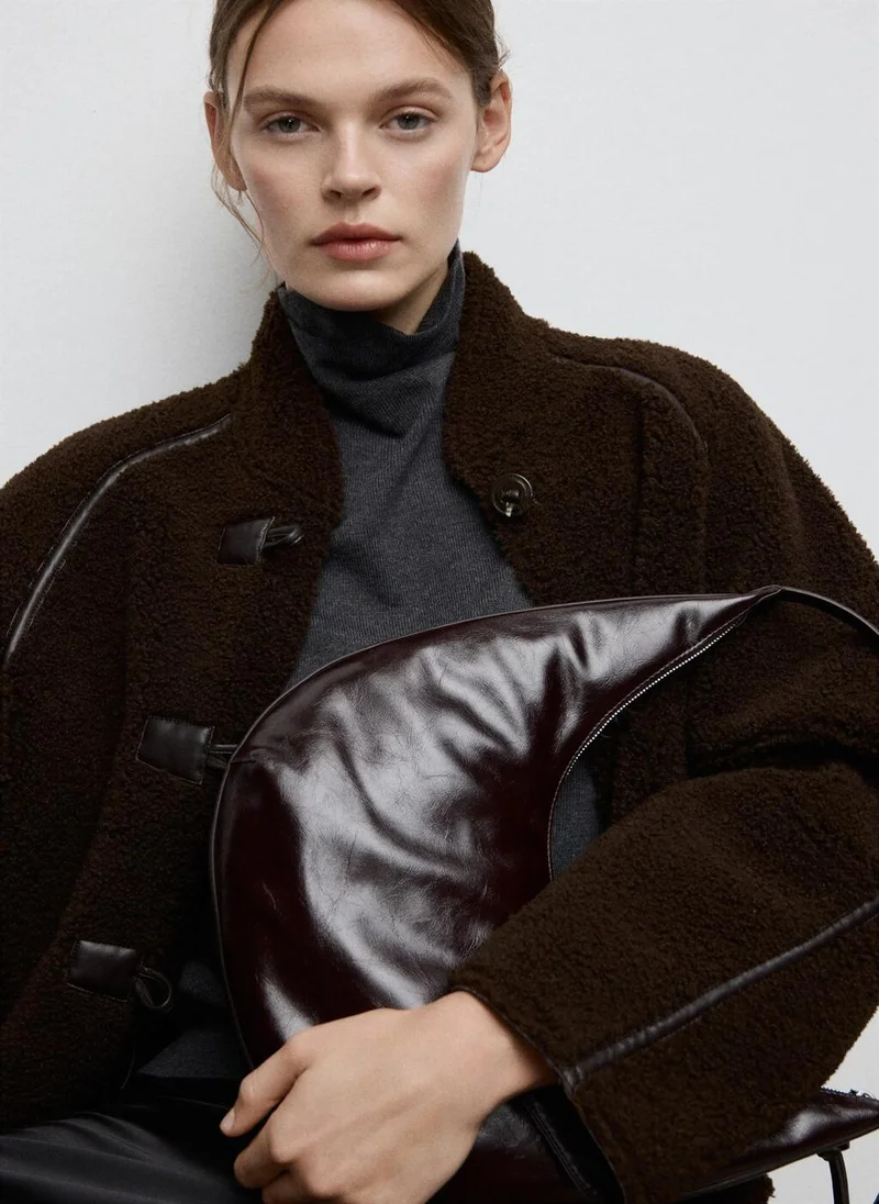 مانجو Medium oval shoulder bag