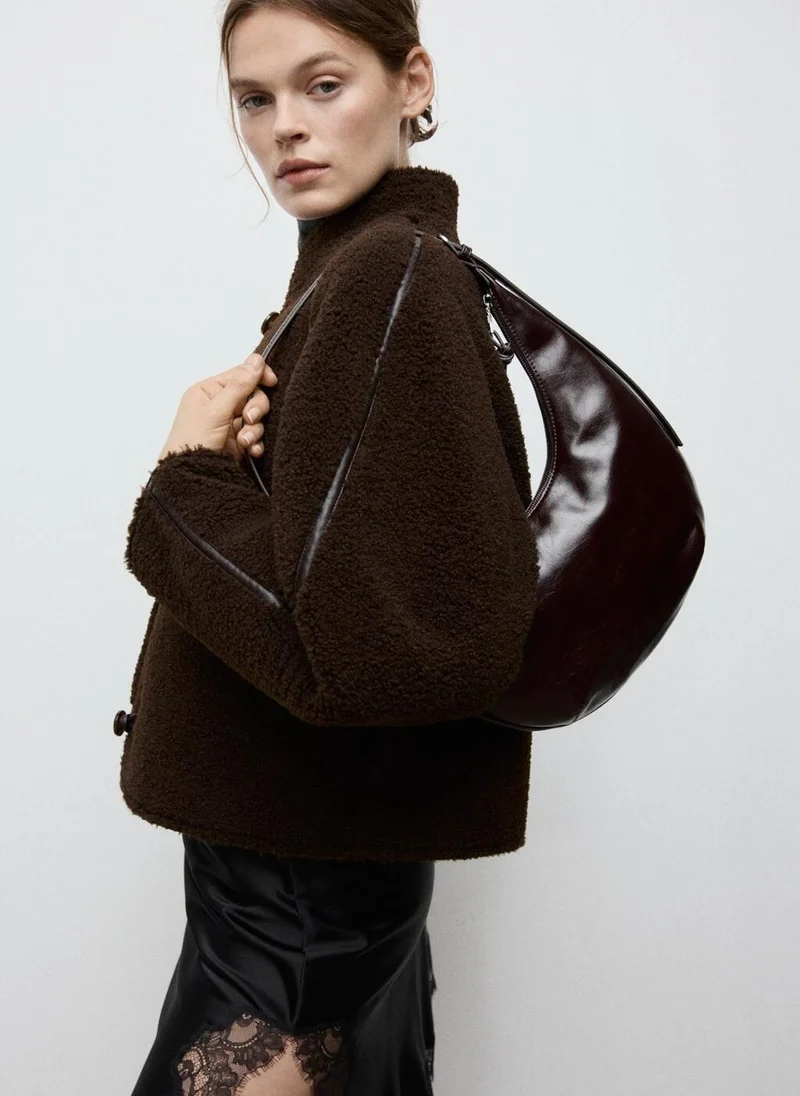 مانجو Medium oval shoulder bag