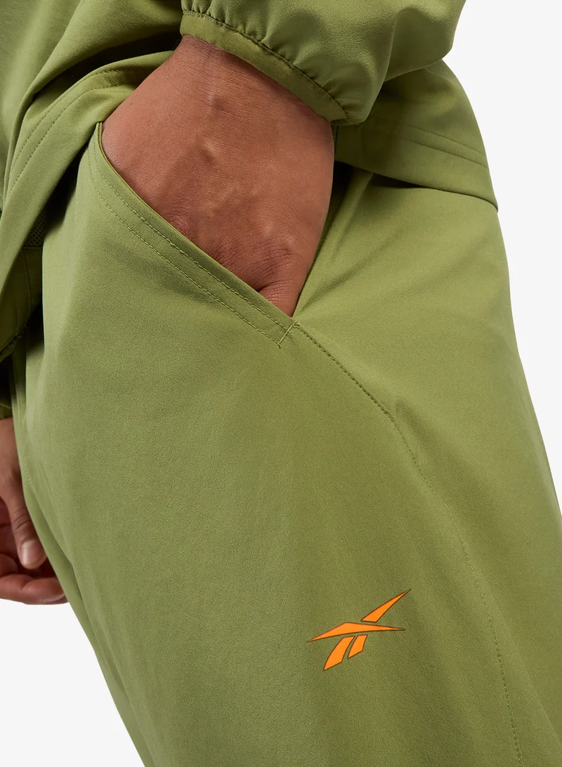 Reebok  Identity Train Woven Unlined Sweatpants for Men | Best Price UAE