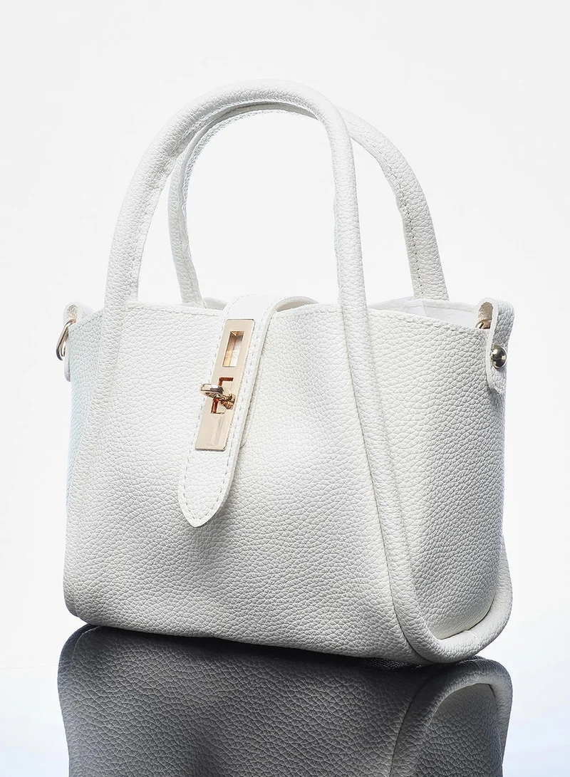 صوص هاوت شنطة بحمالة عادي انيقة من جلد نباتي بالتعشيق للنساء