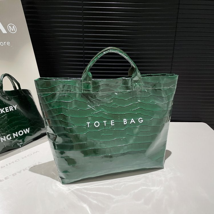 Selling Casual Large-Capacity Letter Tote Bag For Women 2025 Summer Trendy Stone Pattern Girl Commuter Handbag - Image 1