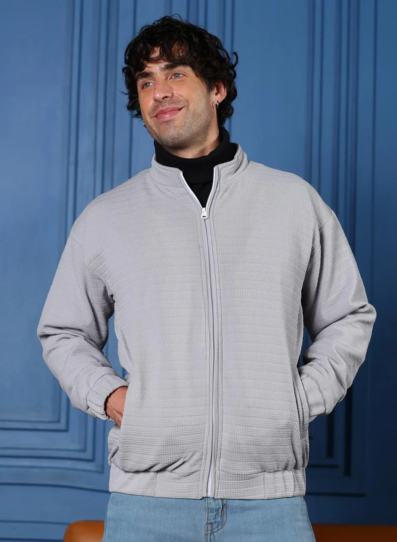 Campus Sutra Men Chevron Panel-Tactile Bomber Jacket | Band Collar, Long Stretch-Cuff Sleeves | Zipper , Stretch-Straight Hem | Solid Textured | Woven Fabric For Casual & Daily Wear | Cloud Grey
