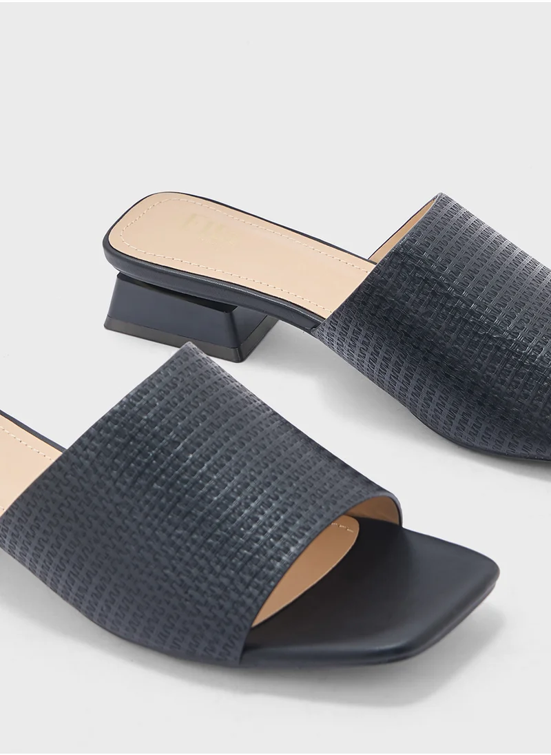 ايلا Textured Square Toe Mule Sandal
