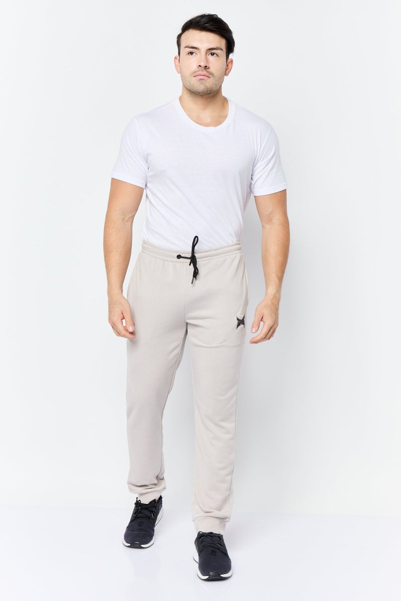 TapouT سروال جوجر للرجال بقصة عادية مع حبل شد وشعار العلامة التجارية، رمادي - Image 2