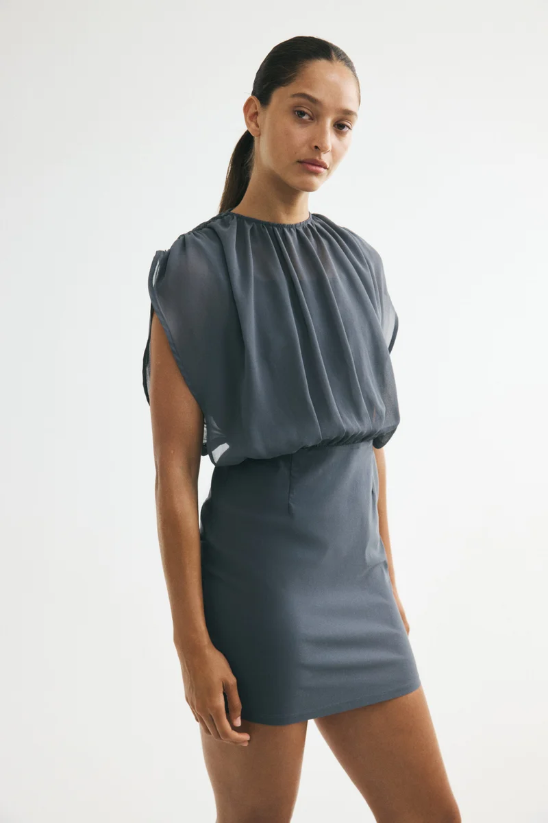 Dual-fabric draped dress