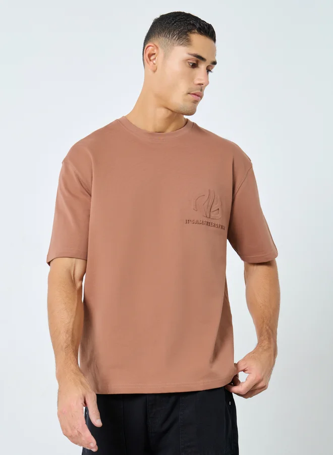 ستايلي Styli Coffee Brown Oversized Embossed Slogan T-Shirt
