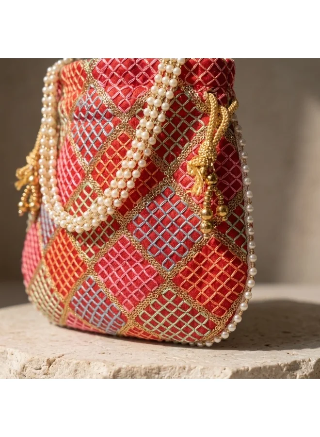 Mobcos Mobcos Orange Gold Chex Floral Print Potli Bag Mobcos Orange Gold Chex Handcrafted Indian Embroidered Mirror Work Potli Bag for Women | Premium Silk Blend Ethnic Drawstring Handbag with Pearl Handle | Wedding, Bridal, Party & Festive Purse for Women | Best Price UAE