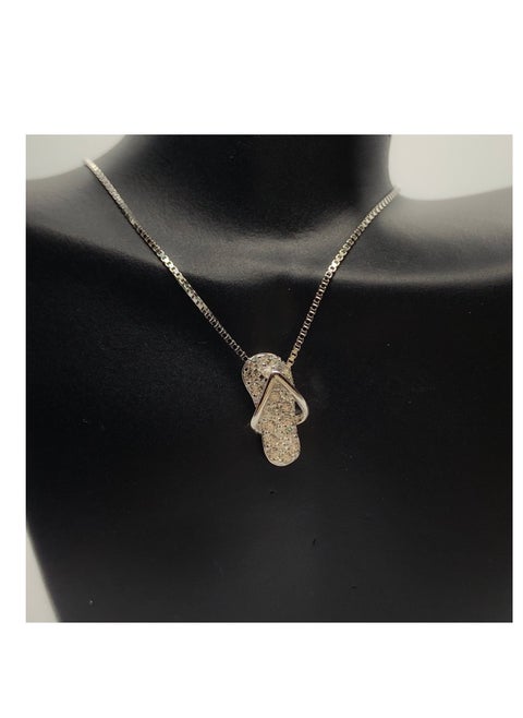 A Unique Silver women's necklace with a shoe-shaped pendant design