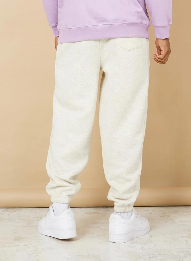 Styli Mickey Mouse Print Pocket Placement Print Oversized Joggers