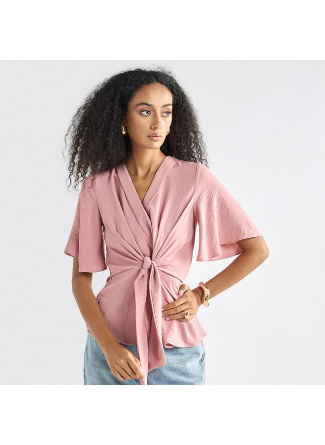 FAV Solid V-neck Top with Flutter Sleeves and Knot Detail  - Image 1