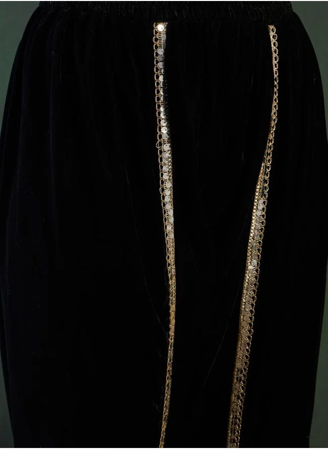 ISHIN Festive Women Black Velvet Kurta Set with Embroidered pattern Tunic and Palazzo features a Round neckline and Three-Fourth Sleeve secured with Elastic closure and styled in Straight Fit ideal for Festive moments — exude elegance in every glance.
