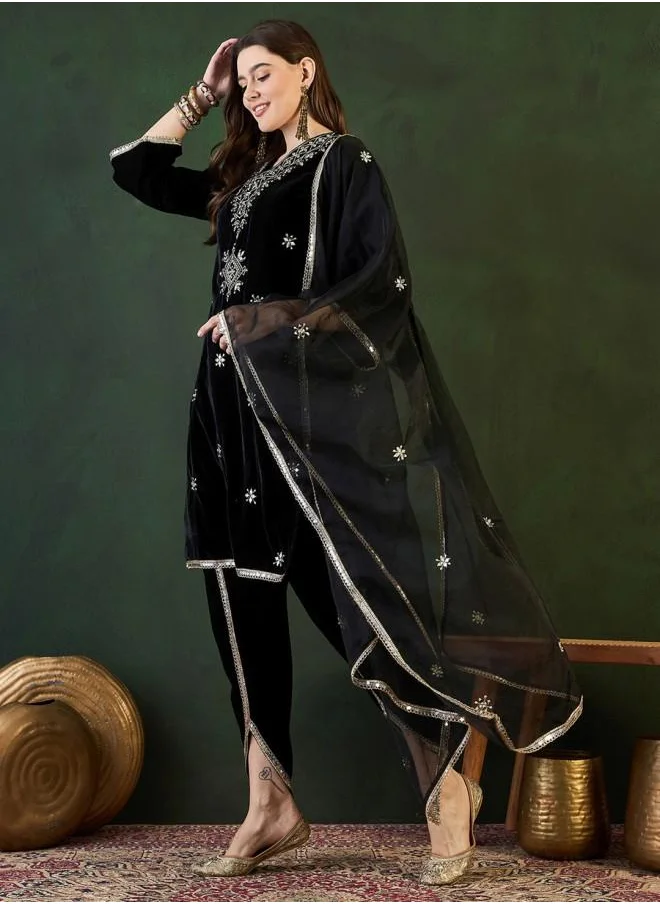 ISHIN Festive Women Black Velvet Kurta Set with Embroidered pattern Tunic and Palazzo features a Round neckline and Three-Fourth Sleeve secured with Elastic closure and styled in Straight Fit ideal for Festive moments — exude elegance in every glance.