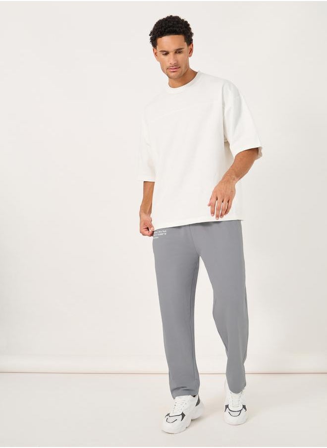Styli - Slogan Print Oversized Open Hem Joggers - Image 1
