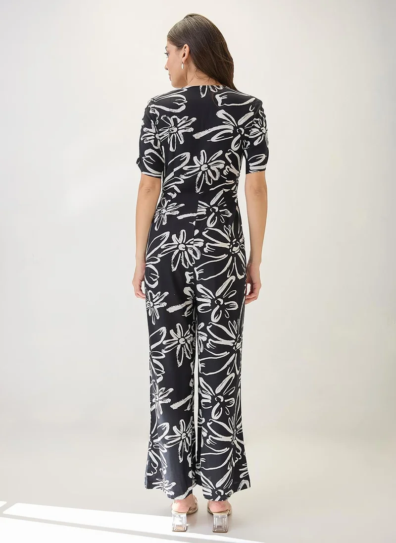 Globus Black Globus Women V-Neck Ruched Sleeves Floral Print Longline Jumpsuit for Women | Best Price UAE