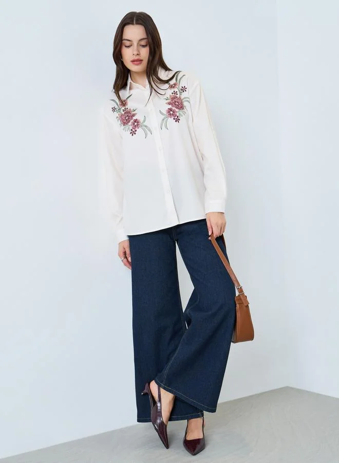 ستايلي بلوزة مُطرّزة بزهور مع اكمام طويلة