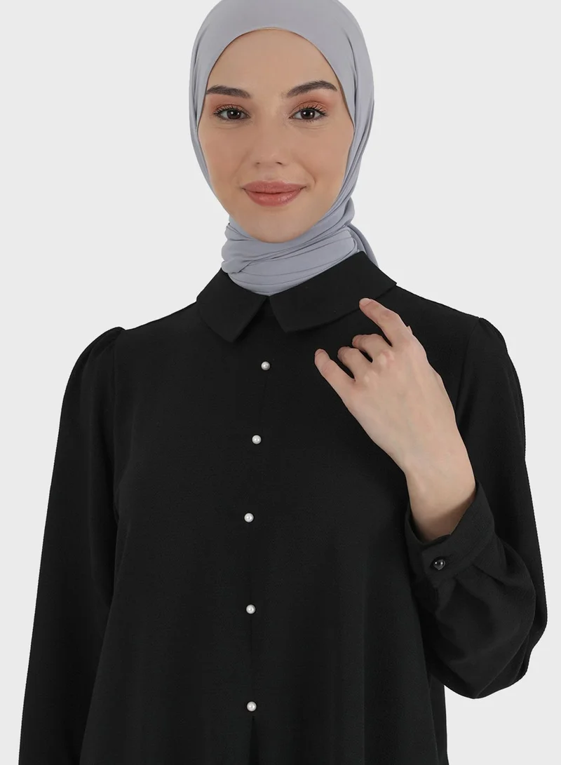 تافين من مودانيسا تونيك بحواف غير متناظرة
