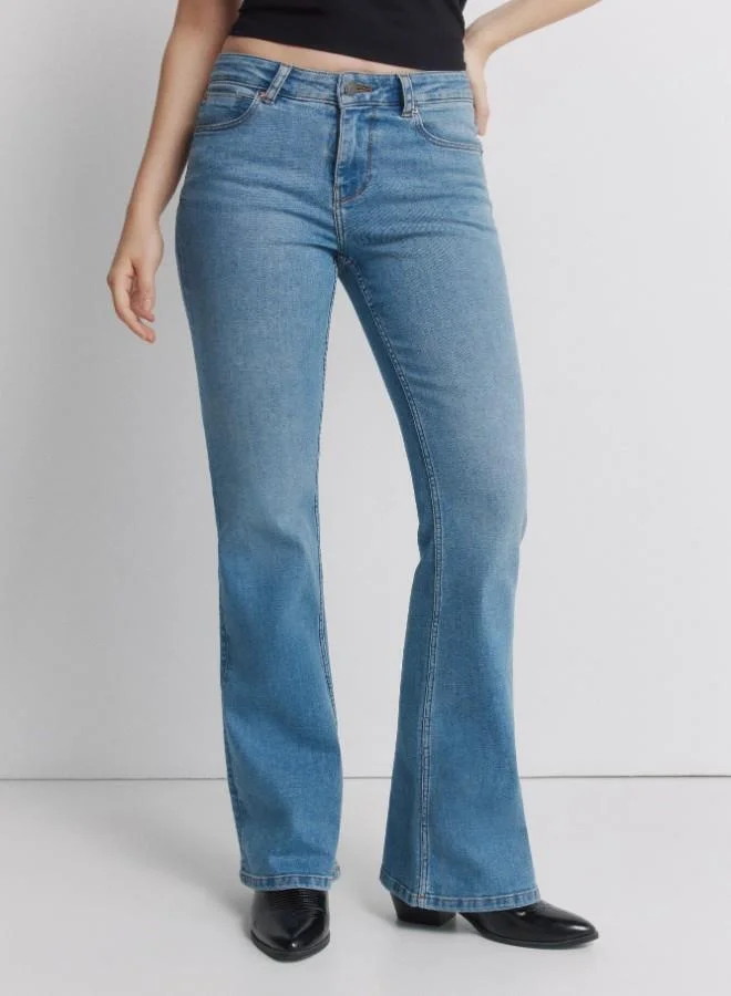 Springfield  Mid-rise fitted leg flared hem jeans for Women | Best Price UAE