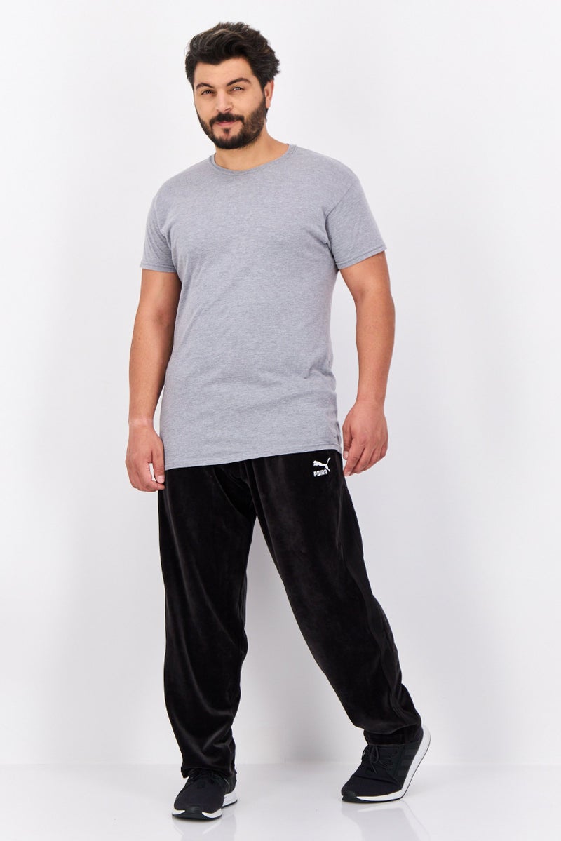 PUMA Men Sportswear Fit Embroidered Logo Outdoor Track Pant, Black - Image 4