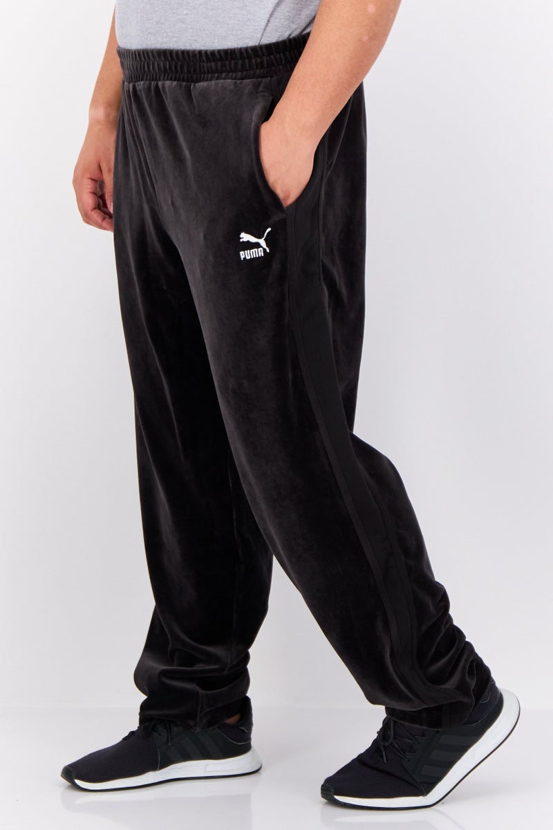 PUMA Men Sportswear Fit Embroidered Logo Outdoor Track Pant, Black - Image 2