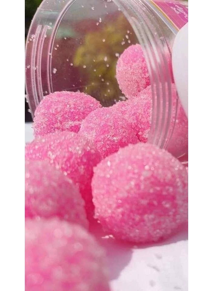 Candy - C Sweet Sugar Ball Body Scrub. This sugar ball body scrub brightens the complexion and removes dead skin cells, leaving your skin feeling silky smooth. It helps treat hyperpigmentation and can be used on sensitive areas. It also helps prevent breakouts and softens rough skin. - Image 2