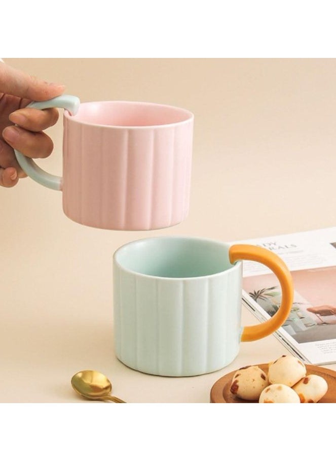 Simple round ceramic coffee mug for hot and cold drinks with a comfortable handle, multi-colore