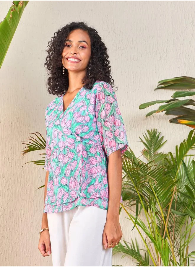 SASSAFRAS Tulip Print Wrap Peplum Top by Styli