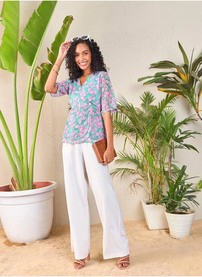 SASSAFRAS Tulip Print Wrap Peplum Top by Styli