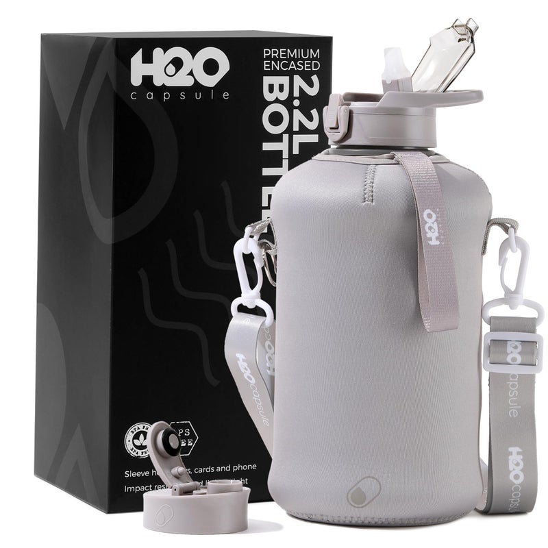 H2O Capsule 2.2L Half Gallon Water Bottle with Storage Sleeve and Covered Straw Lid â€“ BPA Free Large Reusable Drink Container with Handle - Big Sports Jug, 2.2 Liter (74 Ounce) Navy Blue - Image 1