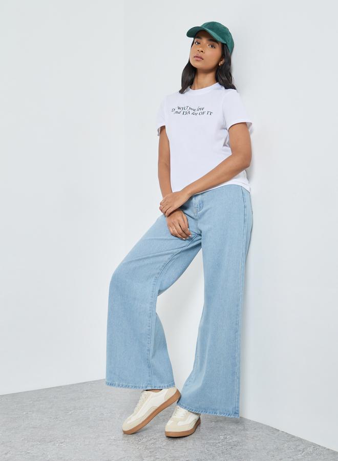 ستايلي جينز واسع الساق بخصر متوسط وبلون باهت - Image 1