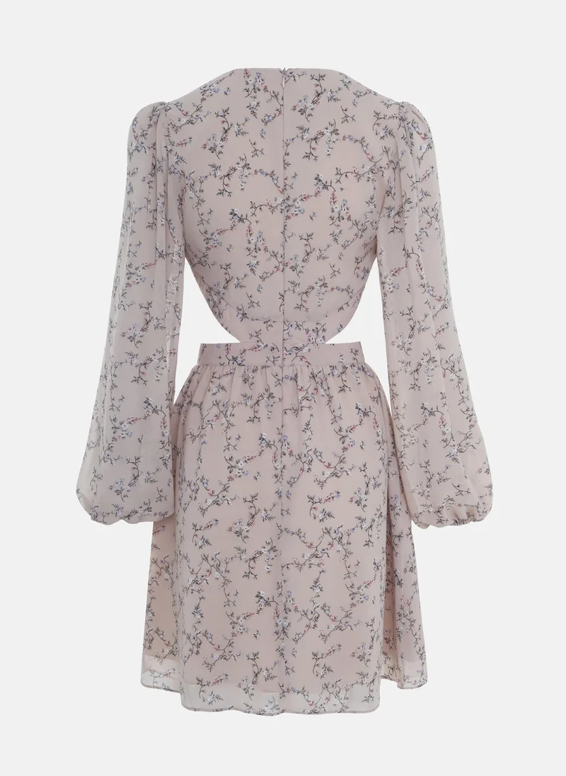 Lichi Mini dress from flowing fabric with waist and collar cutouts