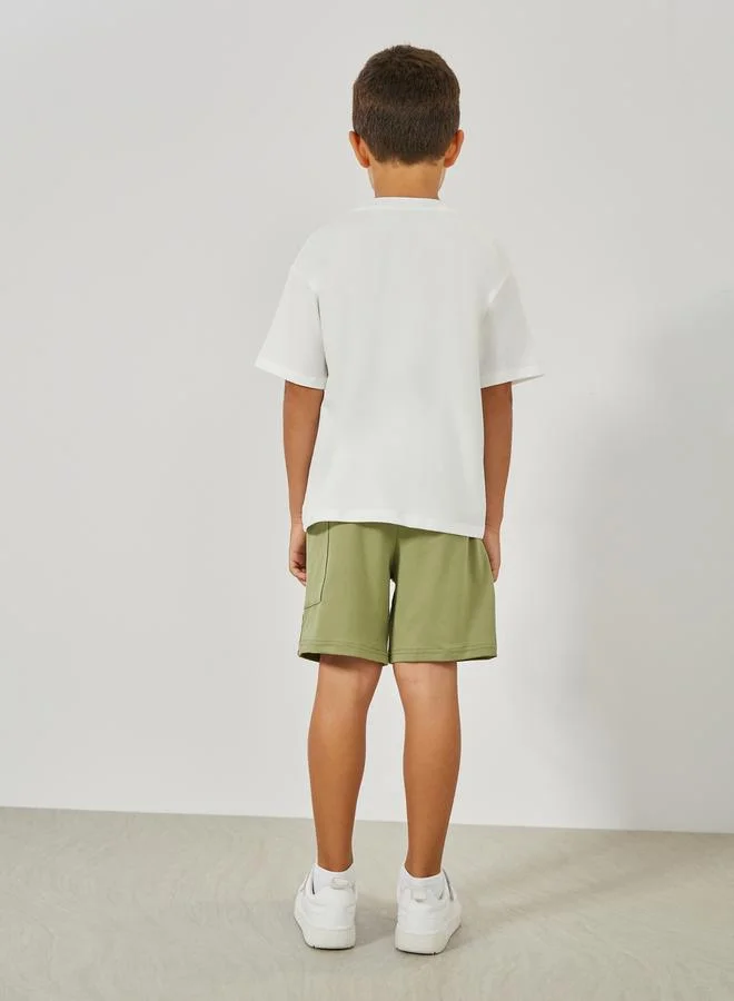 ستايلي Embossed Slogan T-Shirt & Pocket Shorts Set