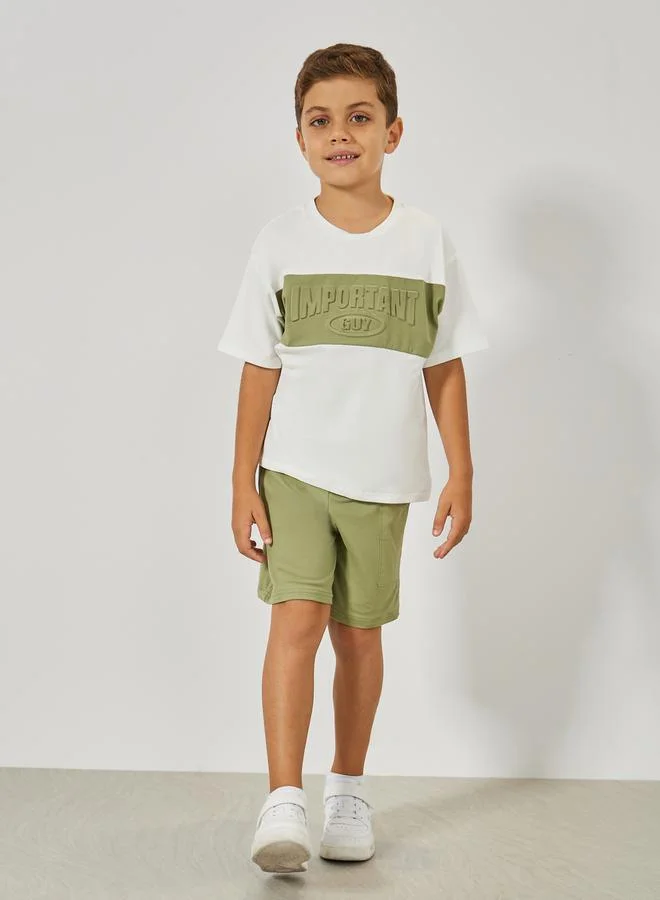 ستايلي Embossed Slogan T-Shirt & Pocket Shorts Set